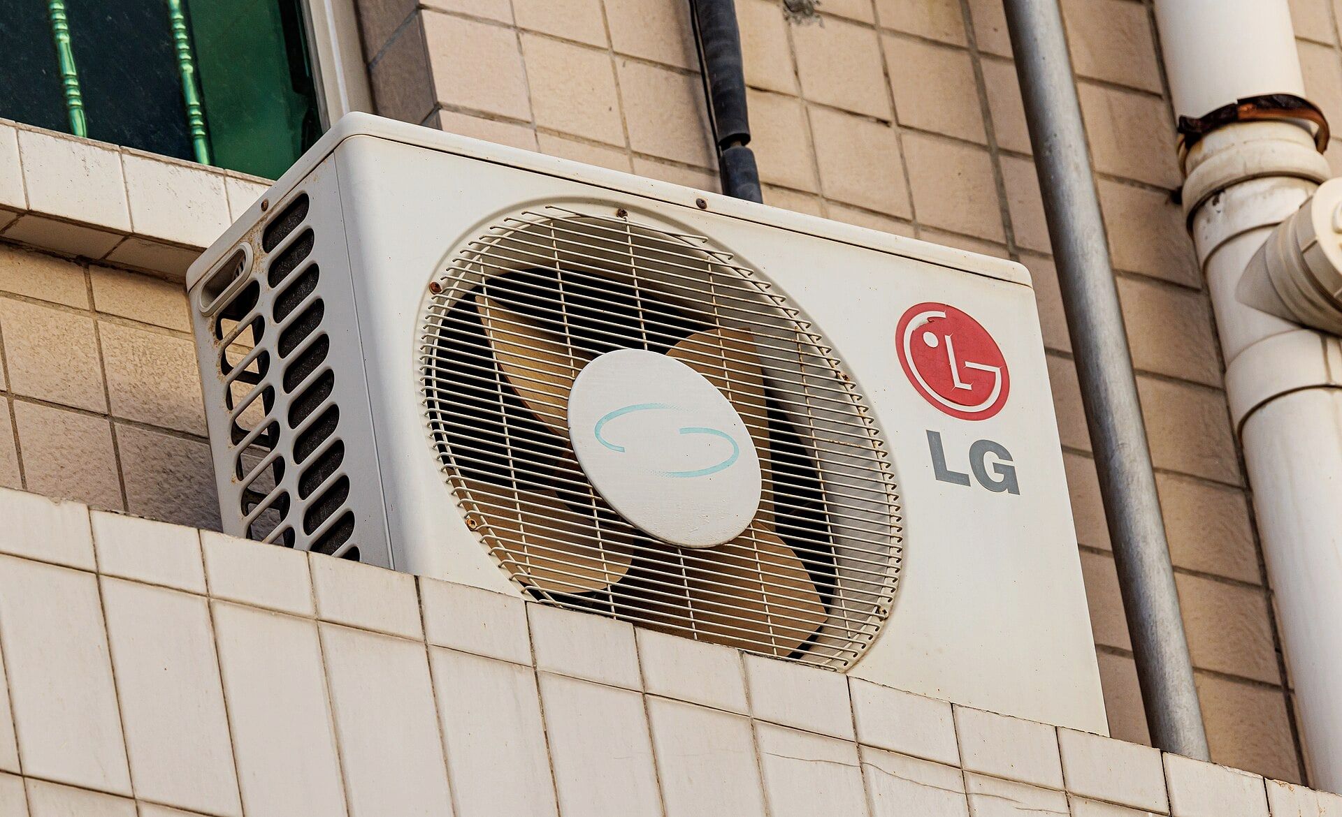 Close-up of an LG outdoor air conditioning unit
